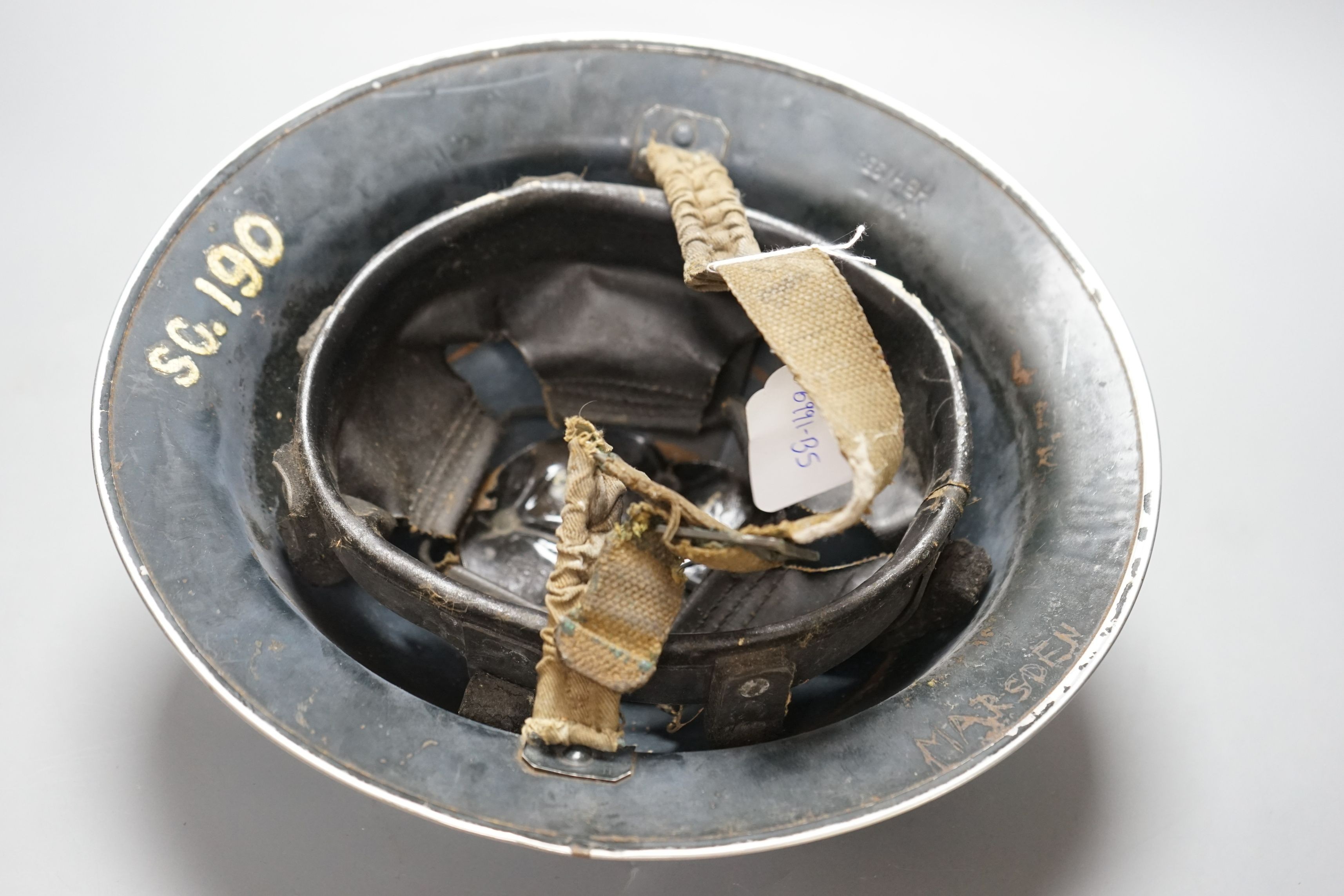 A WW2 period steel Special Constable police helmet, stamped HBH 1938